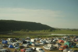 RVs parked closely together in a developed Michigan campground